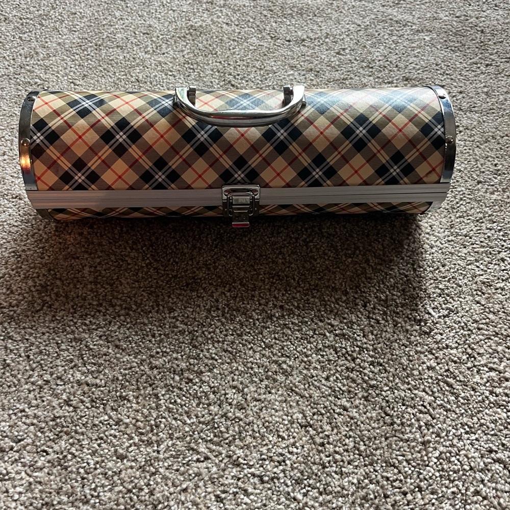 Plaid Wine Holder perfect for safely transporting your wine to the next party.